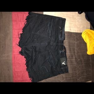 black American Eagle ripped jean shorts